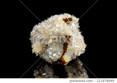 Macro mineral stone crystals Hemimorphite rock on a black background Macro mineral stone crystals Hemimorphite rock on a black background 122879949