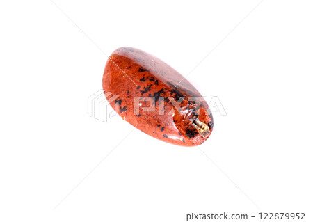 Macro mineral stone Obsidian on a white background Macro mineral stone Obsidian on a white background 122879952