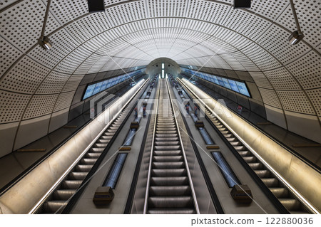 Futuristic Escalators in London Underground Station. Modern Architecture and Lighting 122880036