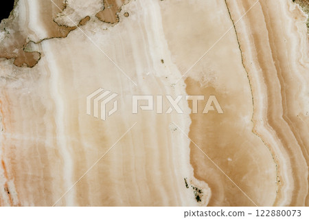 macro stone mineral marble Onyx on a black background macro stone mineral marble Onyx on a black background 122880073