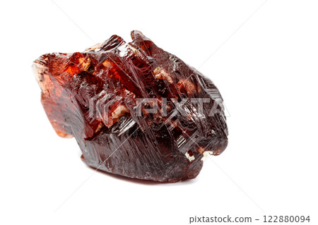 Macro mineral stone Garnet Spessartine on a white background Macro mineral stone Garnet Spessartine on a white background 122880094