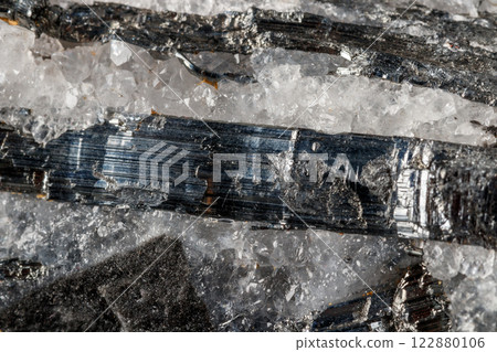Macro mineral stone Stibnite quartz on a black background 122880106