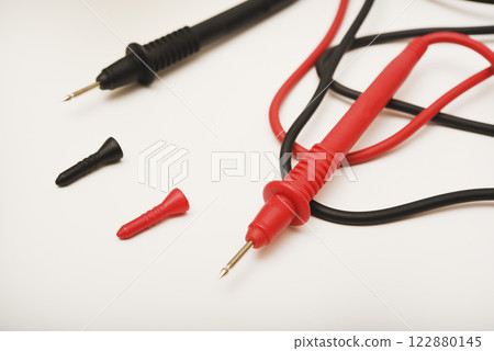 Probes for multimeter. The red and black wires of the measuring device. Probes for multimeter. The red and black wires of the measuring device. 122880145