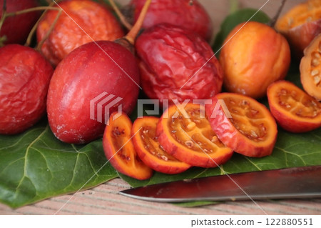 Harvested ripe tamarillos 122880551