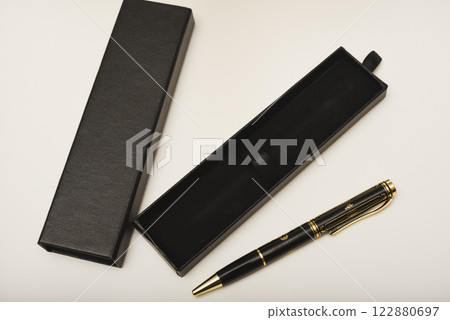 A gift pen in a box. A black fountain pen. 122880697