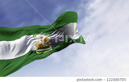 Andalusia flag waving in the wind 122880705