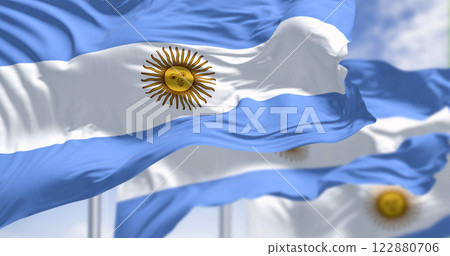 Argentina national flags waving on a clear day Argentina national flags waving on a clear day 122880706