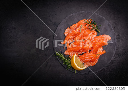 Traditional Norwegian fresh salmon in slices 122880805