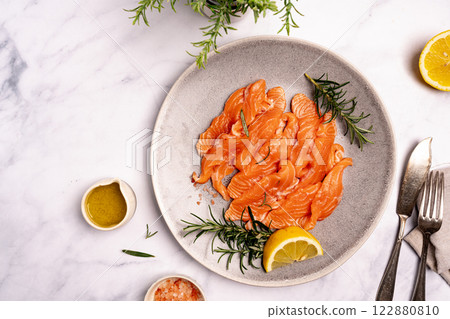 Traditional Norwegian fresh salmon in slices Traditional Norwegian fresh salmon in slices 122880810