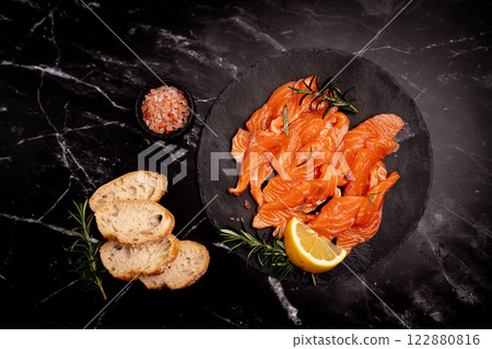 Traditional Norwegian fresh salmon in slices Traditional Norwegian fresh salmon in slices 122880816