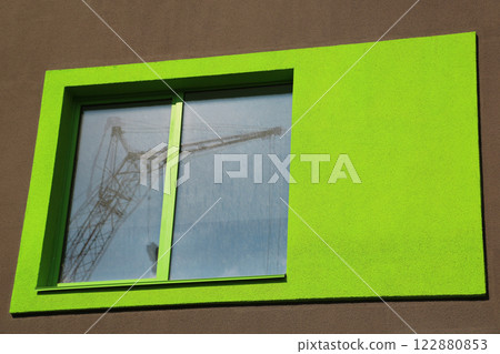 New building with green window New building with green window 122880853