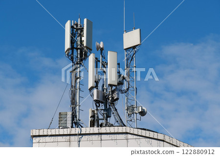 Cell Towers on sky background 122880912