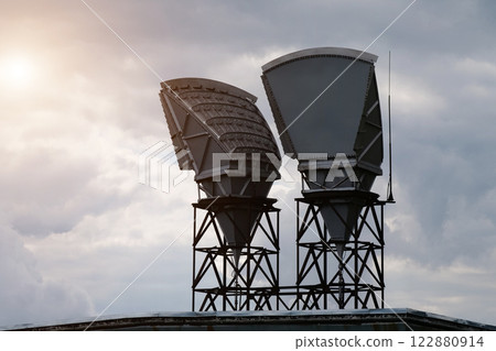 Horn antennas and clouds background 122880914