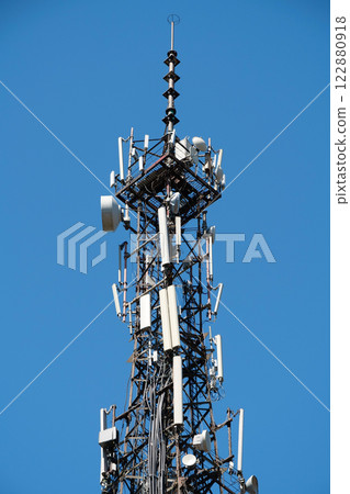 5G Cell tower on sky background 122880918