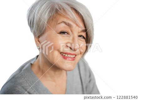 Confident stylish European middle aged senior woman. Older mature lady smiling isolated on white background. Happy attractive senior female looking camera close up face headshot portrait. Happy people 122881540