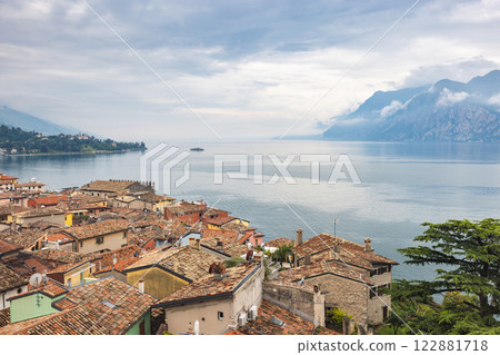 Malcesine town on the eastern shore of Lake Garda, Italy, Europe. Malcesine town on the eastern shore of Lake Garda, Italy, Europe. 122881718