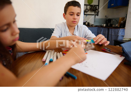 Children creating art at a table Children creating art at a table 122882740