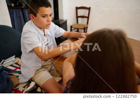 Conversation at Wooden Table Indoors 122882750
