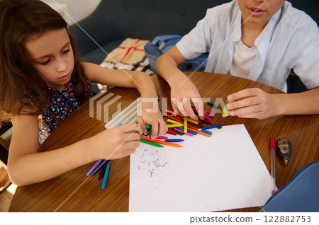 Children Drawing Together at a Table Children Drawing Together at a Table 122882753