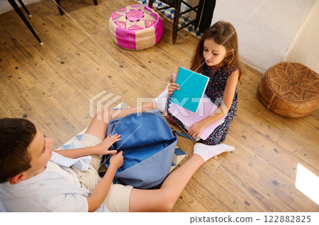 Children preparing books for school 122882825