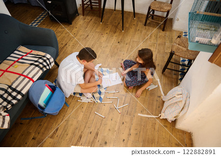 Children Drawing Together on Floor Children Drawing Together on Floor 122882891