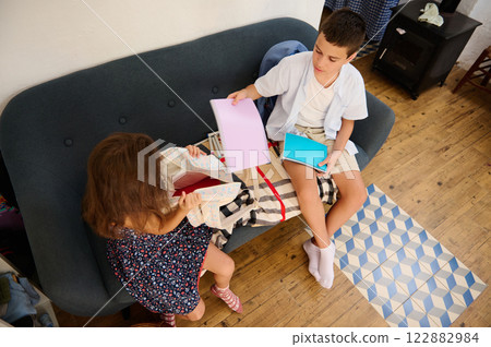 Children Organizing School Supplies Children Organizing School Supplies 122882984