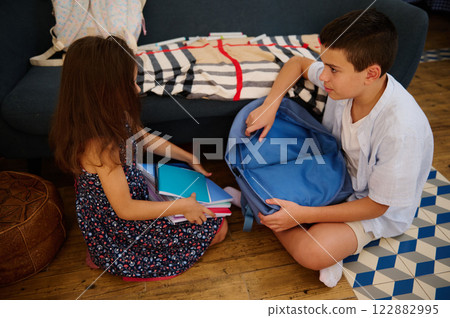 Children Organizing Items Together Children Organizing Items Together 122882995