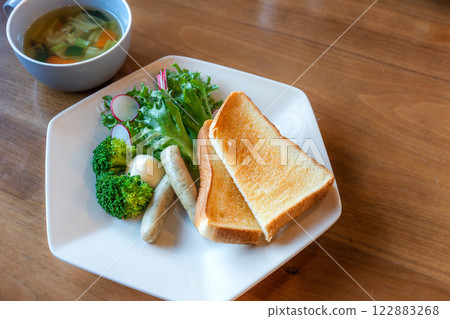 Healthy western breakfast, balanced meal of toast and vegetable soup 122883268