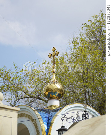 small dome and cross of the Orthodox chapel. Orthodox religion 122883345