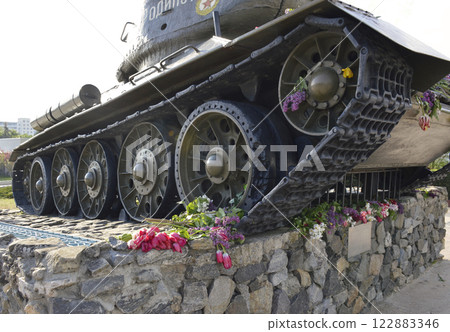 flowers near the tank at the memorial to those killed in the war flowers near the tank at the memorial to those killed in the war 122883346