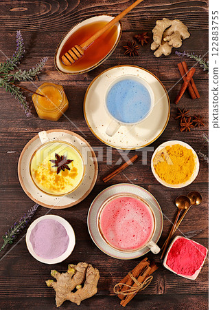 A variety of Japanese tea, matcha latte, golden turmeric, lavender blue and pink moon milk. The trendy healthy drink promotes weight loss, relaxes before bed and has anti-inflammatory properties. 122883755