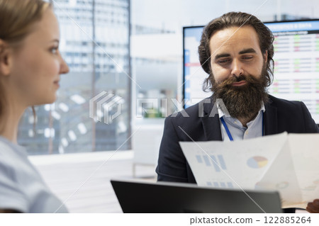 Financial advisor guiding young adult in trading shares and making informed investment decisions. Economic agent offers gen Z girl advice on buying, selling, or holding stocks to optimize returns 122885264