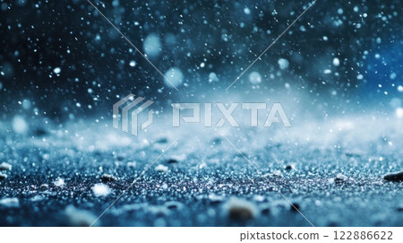 A blue sky with snow falling on the ground 122886622