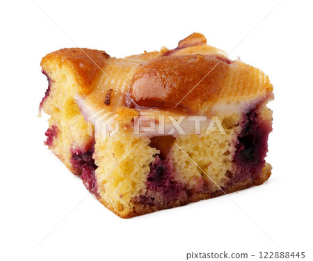 Delicious slice of berry cake featuring a moist texture and a golden-brown top served on a white background 122888445