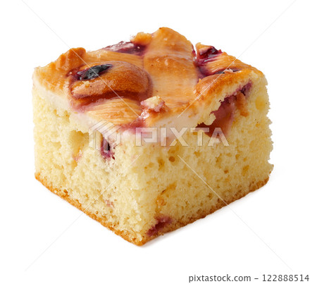 Delicious slice of berry dessert with soft texture and fruity topping ideal for parties or gatherings Delicious slice of berry dessert with soft texture and fruity topping ideal for parties or gatherings 122888514