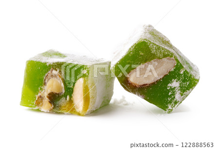 Green Turkish delight with nuts served on a clean background Green Turkish delight with nuts served on a clean background 122888563