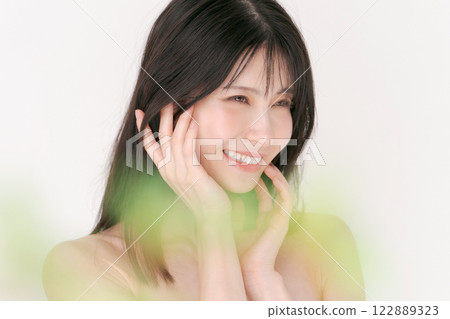 A young woman doing skin care A young woman doing skin care 122889323