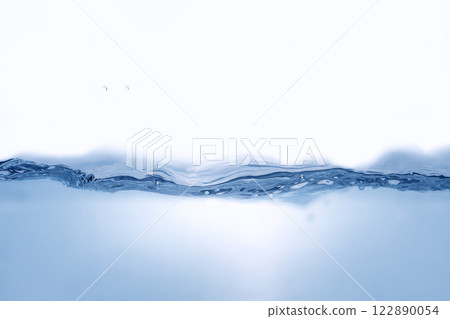 Closeup view of dynamic flowing blue water waves on white background. Liquid splash. Texture and abstract background Closeup view of dynamic flowing blue water waves on white background. Liquid splash. Texture and abstract background 122890054