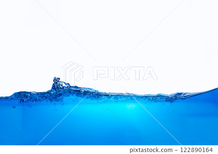 Closeup view of dynamic flowing blue water waves on white background. Liquid splash. Texture and abstract background Closeup view of dynamic flowing blue water waves on white background. Liquid splash. Texture and abstract background 122890164