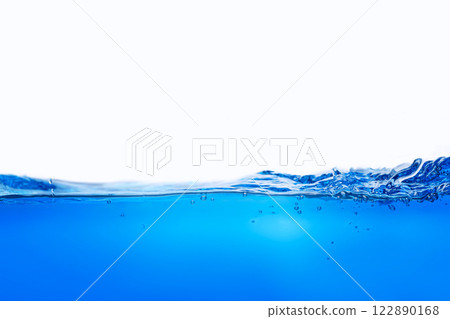 Closeup view of dynamic flowing blue water waves on white background. Liquid splash. Texture and abstract background 122890168