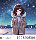 A woman walking along a snowy road while looking at the stars 122890509