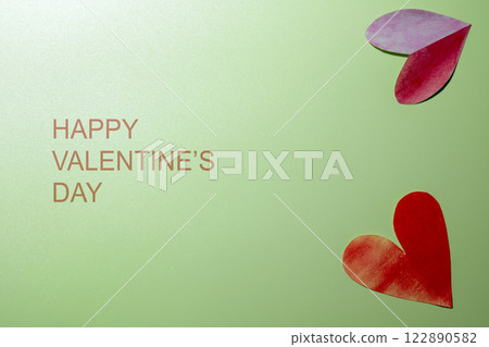 Red hearts with text of Happy Valentine Day on a colored background 122890582