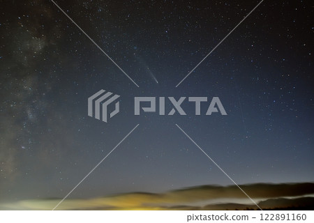 Mount Shikin shining in the sunset sky in the Tokachi region of Hokkaido on October 24, 2024 - Comet Atlas 122891160