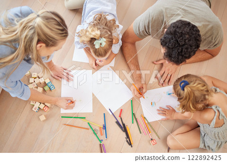 Family with creative children drawing on paper, home school and fun educational activity, learning and project. Above of parents, kids doodle, color and play for healthy growth, development and art 122892425