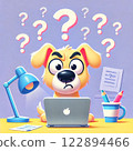 A dog with a questioning expression in front of a computer 122894466