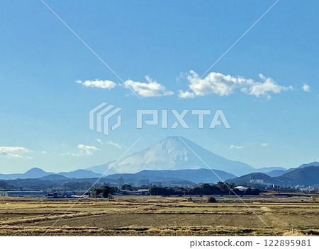 Mt. Fuji in winter seen from a rice field 122895981