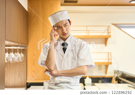 A troubled Japanese chef A troubled Japanese chef 122896292