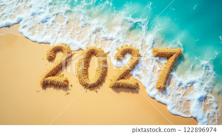 Sandy numbers representing the year 2027 on a sunny beach near gentle ocean waves 122896974