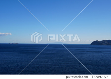 An island floating in the sea An island floating in the sea 122897976