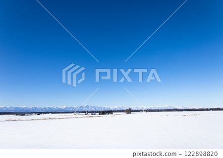 A pleasant view of the Tokachi Plain on a clear winter day A pleasant view of the Tokachi Plain on a clear winter day 122898820